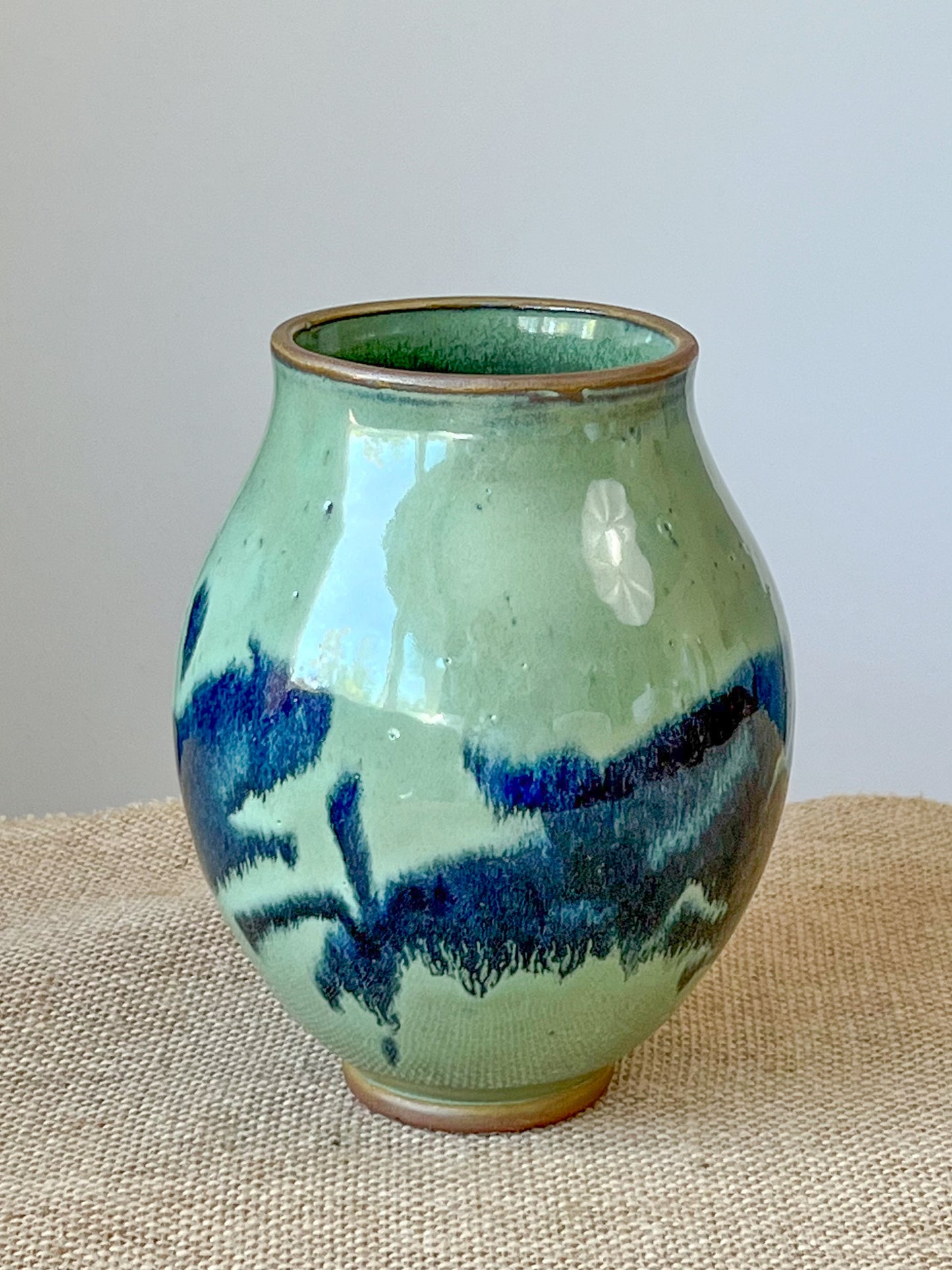 Green Vase with Blue Splash