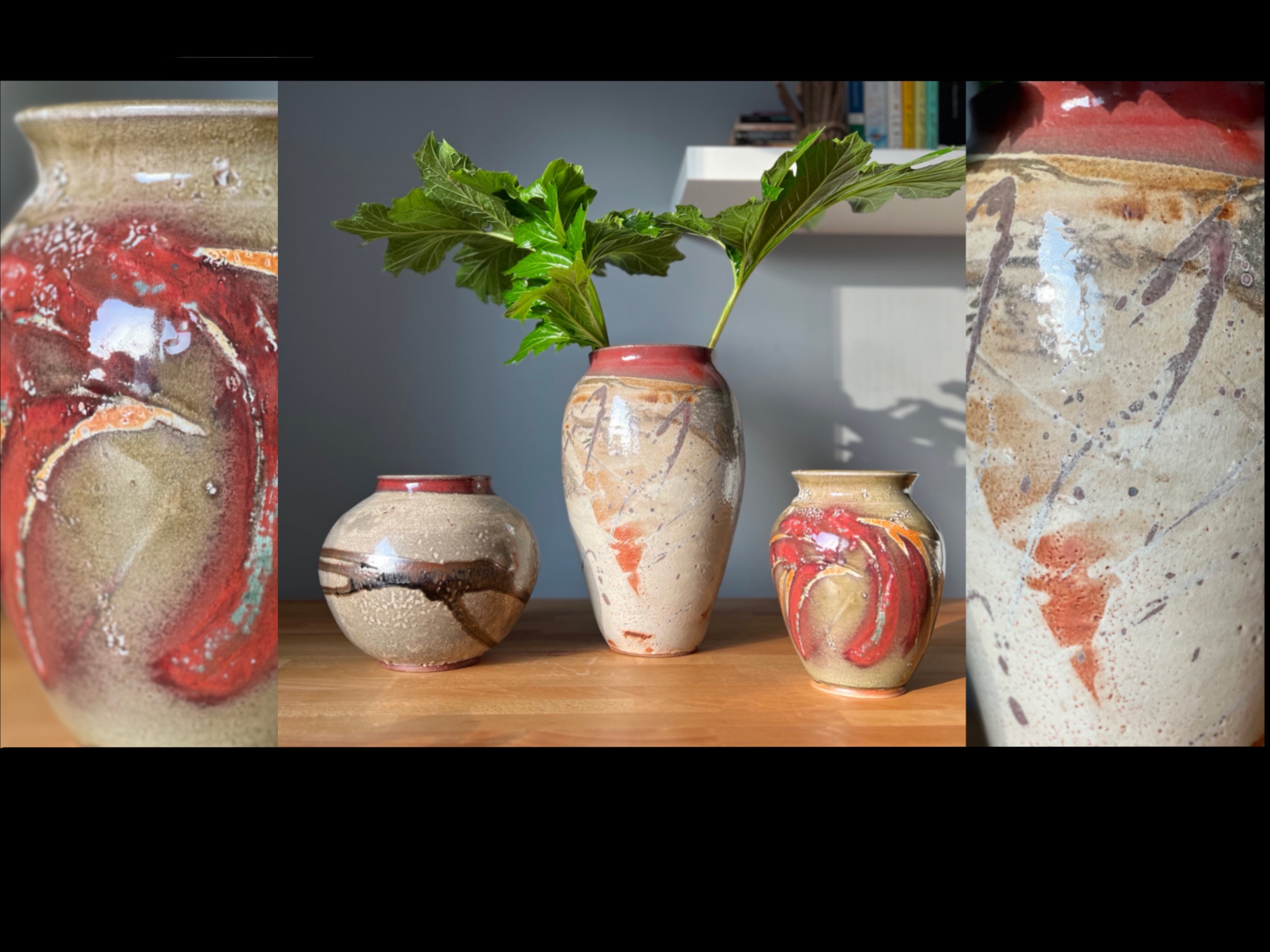 A set of three vases of different shapes, all with the same light brown color and accents of red.